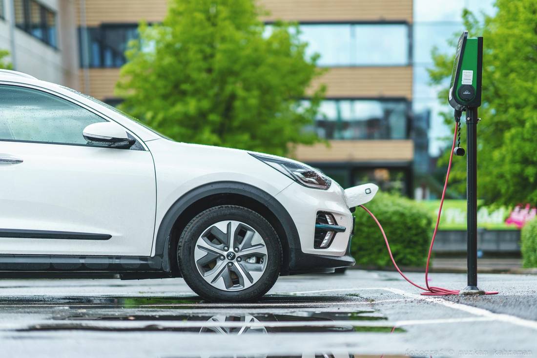 Electric car loading at charging station